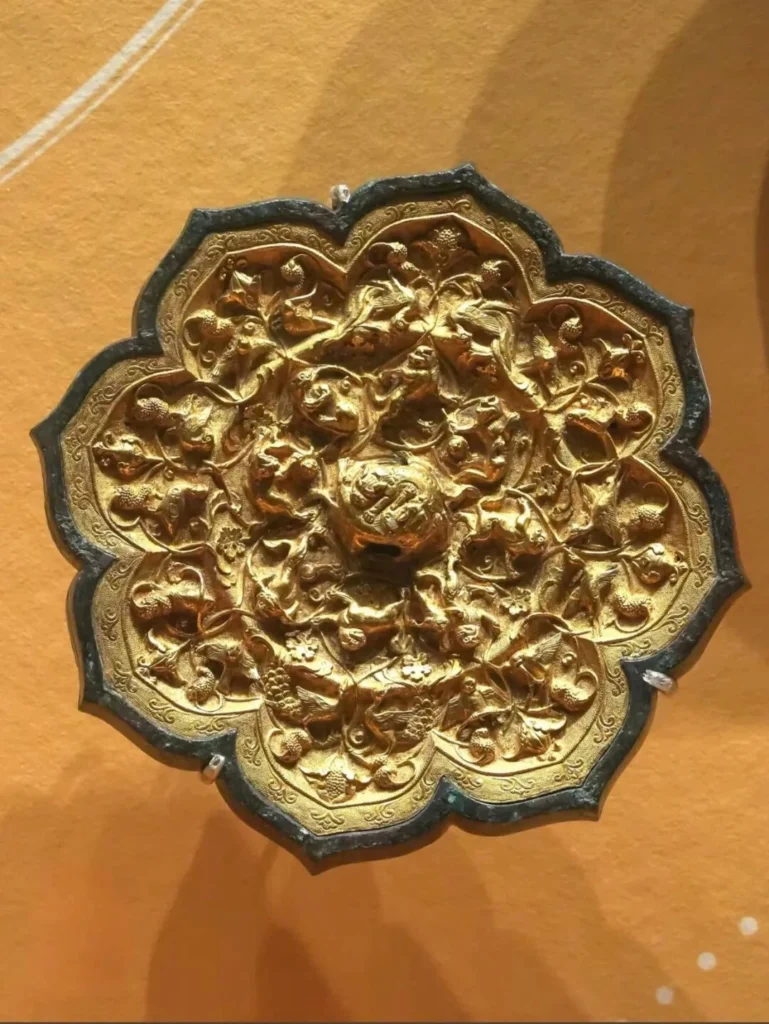 Golden-backed Mythical Beast Grape Mirror: Xi'an Museum—The Pinnacle of Tang Dynasty Bronze Mirror Craftsmanship